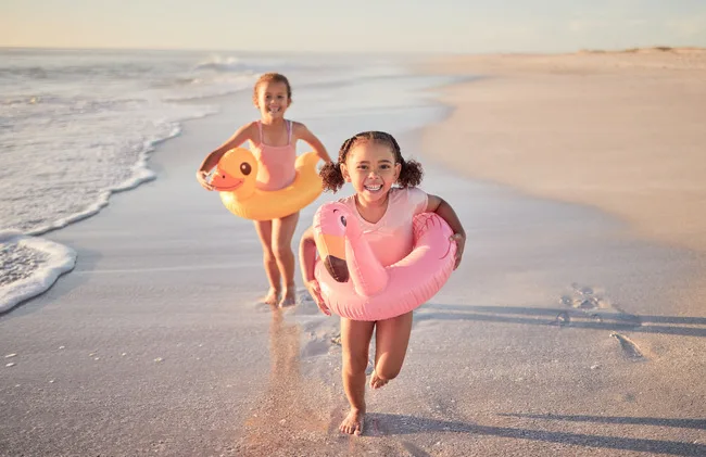 the-tides-amenities-girls-running-kids-and-beach-holiday-vacation The Tides